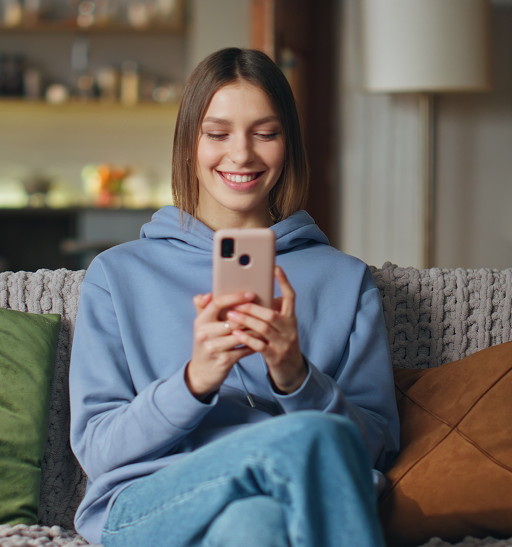 Woman on sofa with phone