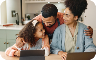 Family relaxing at home with HomeShield protection